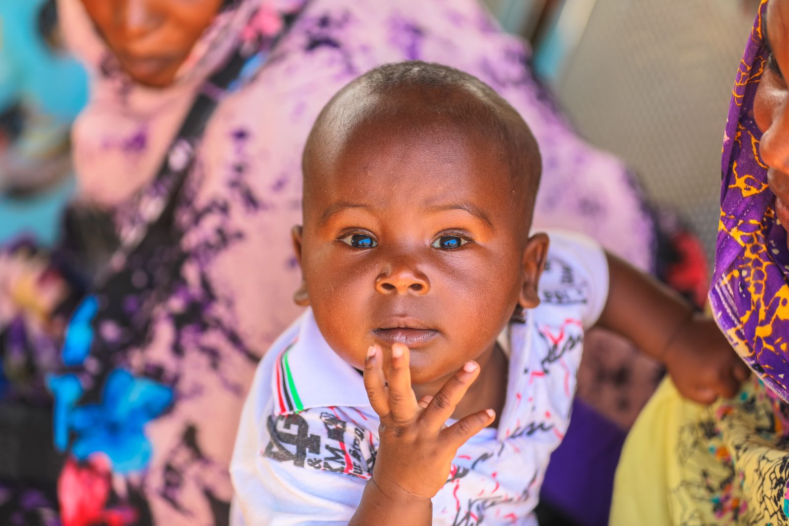 A child in traditional Sudanese clothing